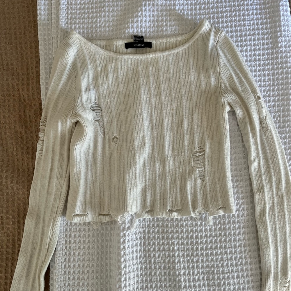 Distressed cropped sweater